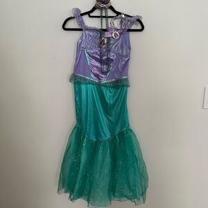 The Little Mermaid Ariel costume with septor, bracelets and necklaces.